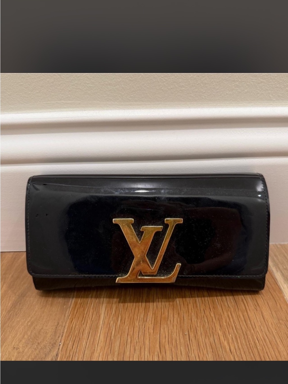 Louis Vuitton Black Patent Leather Clutch with Gold LV Emblem